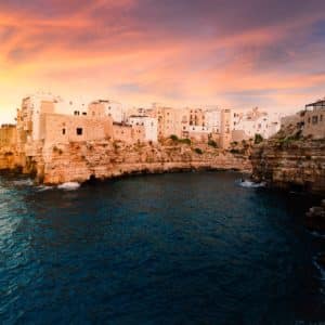 View of the village of Polignano a Mare at sunset